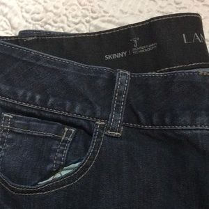 Lane Bryant tummy control dark blue jeans.